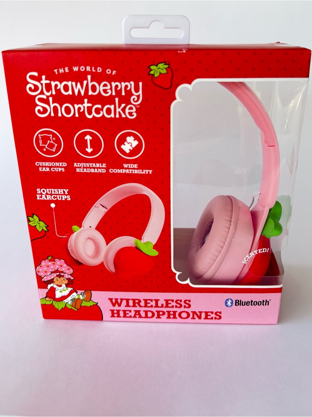 Strawberry Shortcake branded pink wireless Bluetooth headphones